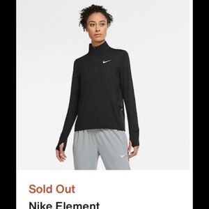 Nike element running top